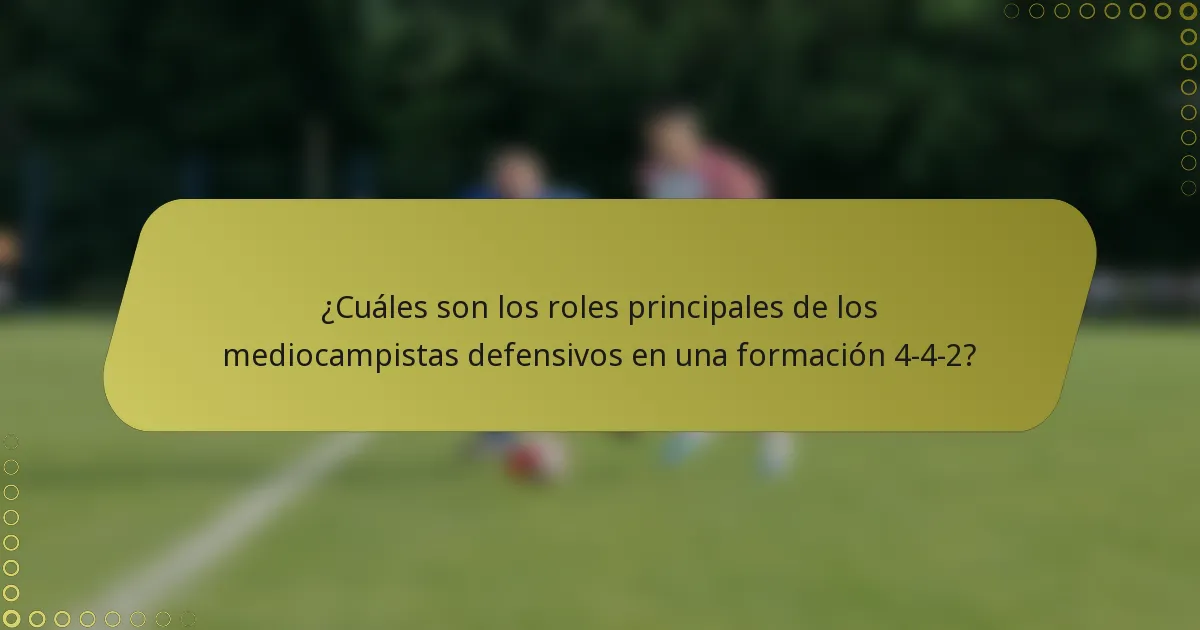 ¿Cuáles son los roles principales de los mediocampistas defensivos en una formación 4-4-2?